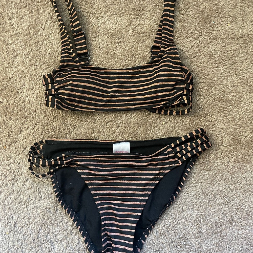 Gold and black stripes xhilaration bikini, matching 2 peice set. Small swim suit